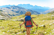 © Westend61 - Woman hiking at Caucasus Mountains on sunny day, Sochi, Russia