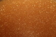 Golden amber softening ion exchange resin background texture