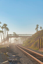 Train Track At San Clemente, California Against The Sunset Sky Background
