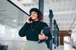 © Jacob Lund - Happy businesswoman taking a phone call in an office