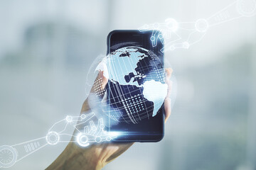 Poster - Creative abstract robotics technology hologram with globe and hand with mobile phone on background, artificial intelligence and machine learning concept. Multi exposure