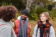 © Johnér - Group of friends talking on autumn walk