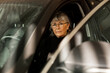 © Johnér - Senior woman in car