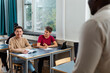 © Johnér - Students learning in classroom