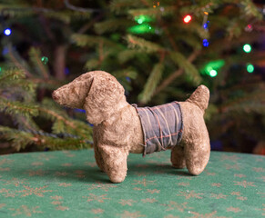 Wall Mural - Vintage stuffed animal, dog figurine - under the christmas tree