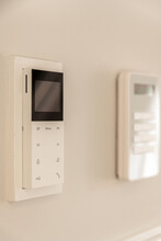 Intercom With Screen Hanging On Wall In Modern House