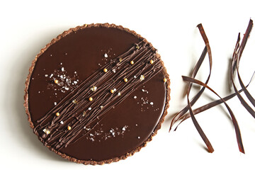 Wall Mural - Chocolate tart isolated on white background