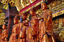 The Statues Of The Buddhist Saints In The Temple