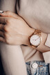 Elegant classic stylish white watch on woman hand