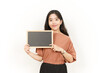 © Sino Images Studio - Showing, Presenting and holding Blank Blackboard Of Beautiful Asian Woman Isolated On White
