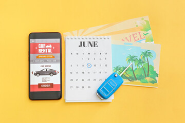 Poster - Mobile phone with open car rent app, calendar and key on yellow background