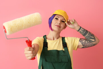 Sticker - Female painter in cap with roller on pink background