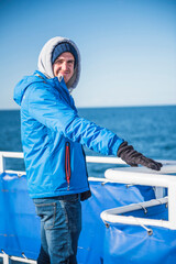 Wall Mural - Tourist on a whale watching boat, Reykjavik, Iceland, Europe