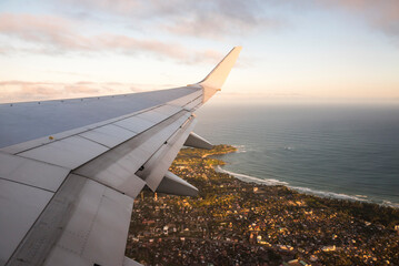 Wall Mural - View of airplane wing at sunset, Madagascar, Africa