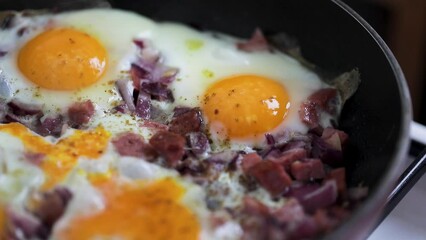 Wall Mural - Eggs scramble with ham on hot pan