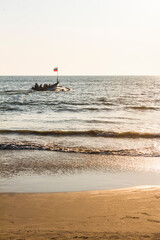 Wall Mural - Tourist boat at Palolem Beach at sunset, Goa, India