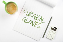 Sign Displaying Surgical Gloves. Business Approach To Protect From The Exposure To Infectious Materials Multiple Assorted Collection Office Stationery Photo Placed Over Table