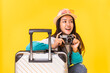 © anon - Tourist woman in summer casual clothes.Asian Smiling woman .Passenger traveling abroad to travel on yellow colour background.Asian woman going to summer vacation.Travel trip funny.