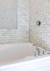 Wall Mural - Vertical Alcove bathtub with marble subway tile surround and shower head