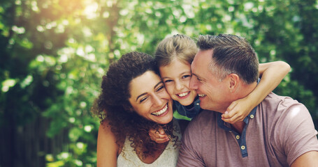 Sticker - Enjoy the weekend with the people you love. Portrait of an affectionate little girl spending quality time with her mother and father outdoors.