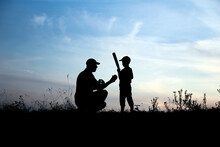 Silhouette Of Father And Son Playing Baseball On Nature Family Sport