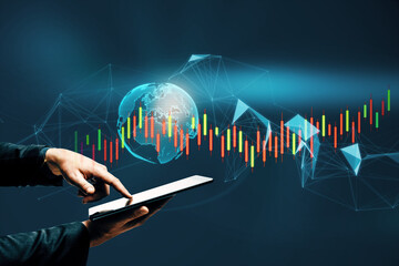 Aufkleber - Close up of man hand pointing at tablet with glowing polygonal globe and candlestick forex chart. Trade, technology and communication concept. Double exposure.