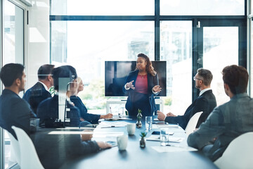 Poster - Lets pivot for a second. Cropped shot of an attractive young businesswoman giving a presentation in the boardroom.