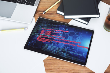 Poster - Modern digital tablet monitor with abstract programming language, research and development concept. Top view. 3D Rendering