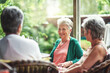 © Cecilie Skjold Wackerhausen/peopleimages.com - Good old friends getting together for drinks. Cropped shot of a group of senior female friends enjoying a lunch date.