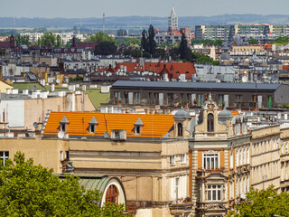 panoramic view from above of old european polish city of Wroclaw, old and new buildings, rooftops and chimneys