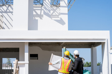 Aufkleber - Engineers discussion with consultants about detail of building plans for new home at construction site,Engineering construction teamwork concept.