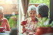© Cecilie S/peopleimages.com - You girls are always such good company. Cropped shot of a group of senior female friends enjoying a lunch date.