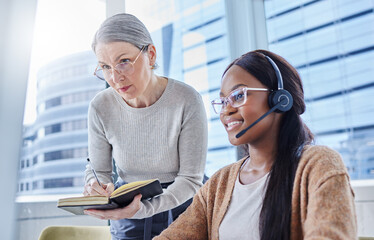 Poster - You work so fast its shocking. Shot of a young businesswoman going over some work with her manager.