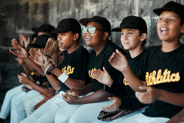 Canvas Print - Their spirit is what keeps their team going. Cropped shot of a group of young baseball players cheering and supporting their team from the bench during a game.