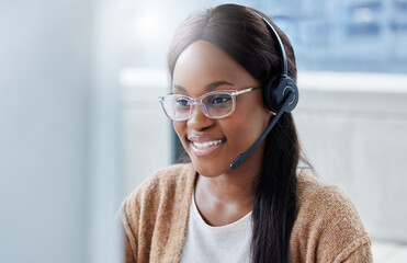Poster - Hi there how may we help you today. Shot of a businesswoman sitting at her desk in a call center office.