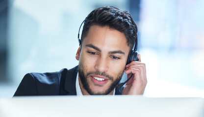 Yes we do help with those problems. Shot of a young businessman working in a call center.