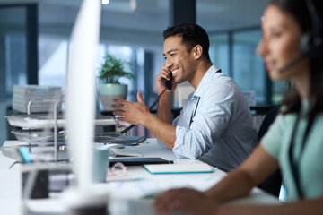 Poster - Good business is based on good communication. Shot of a young man answering the phone while working in a modern call centre.