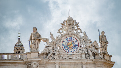 Wall Mural - Dramatic view over Saint Peter Basilica in Vatican city, in the center of Rome, Italy, with heavy clouds.