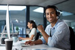 © Nicholas Felix/peopleimages.com - The customer is the real hero of this story. Portrait of a young man using a headset and computer in a modern office.