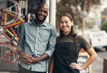 Aufkleber - Were professionals in the industry. Shot of two young business owners standing outside their bicycle shop during the day.