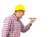 © POL Nefer - worker emotionally and aggressively speaks on the phone. Construction worker in hardhat man screaming on isolated background