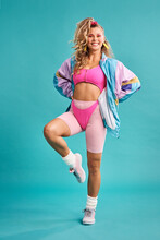 The 80s Was Quite A Colourful Era. Studio Shot Of A Beautiful Young Woman Wearing A 80s Outfit.