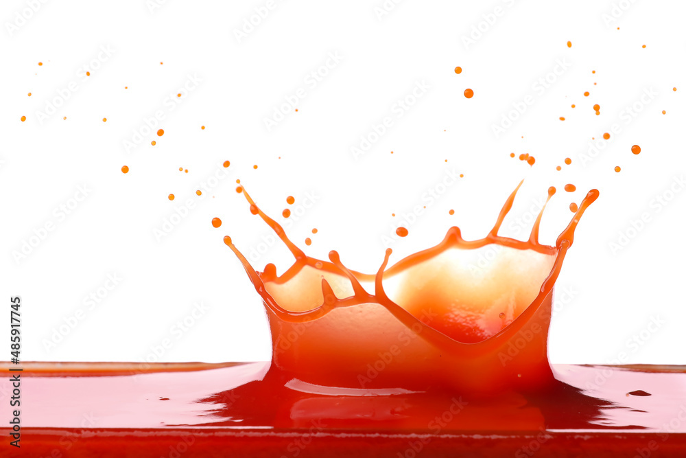 Splashes of tasty tomato juice on white background