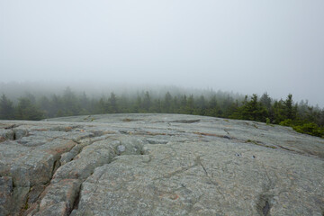 Canvas Print - Fog of low clouds enshrouds the summit of Mt. Kearsarge.