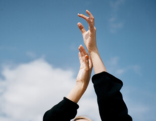 hands up to the sky