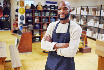 Aufkleber - You have to give 100, and you have to be committed. Shot of a young man working at his job in a shop.
