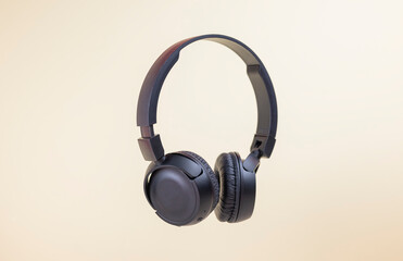 black musical headphones stylish on white background