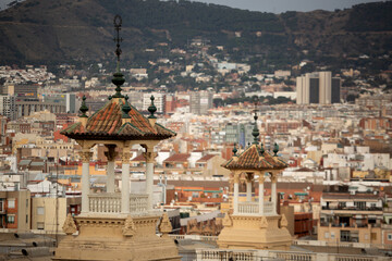 Wall Mural - View over rooftops towards Barcelona city