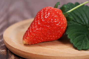 Poster - Fresh strawberries on the plate, fresh strawberries on the table