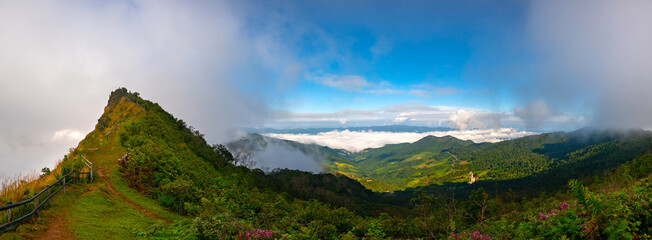 Wall Mural - panorama mountains with fog and sky.